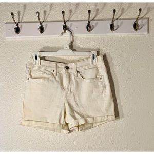 White denim shorts with pockets